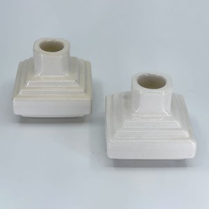 The #716 pyramid candleholders came in both Hostessware and artware glazes. This example is in gloss white.
